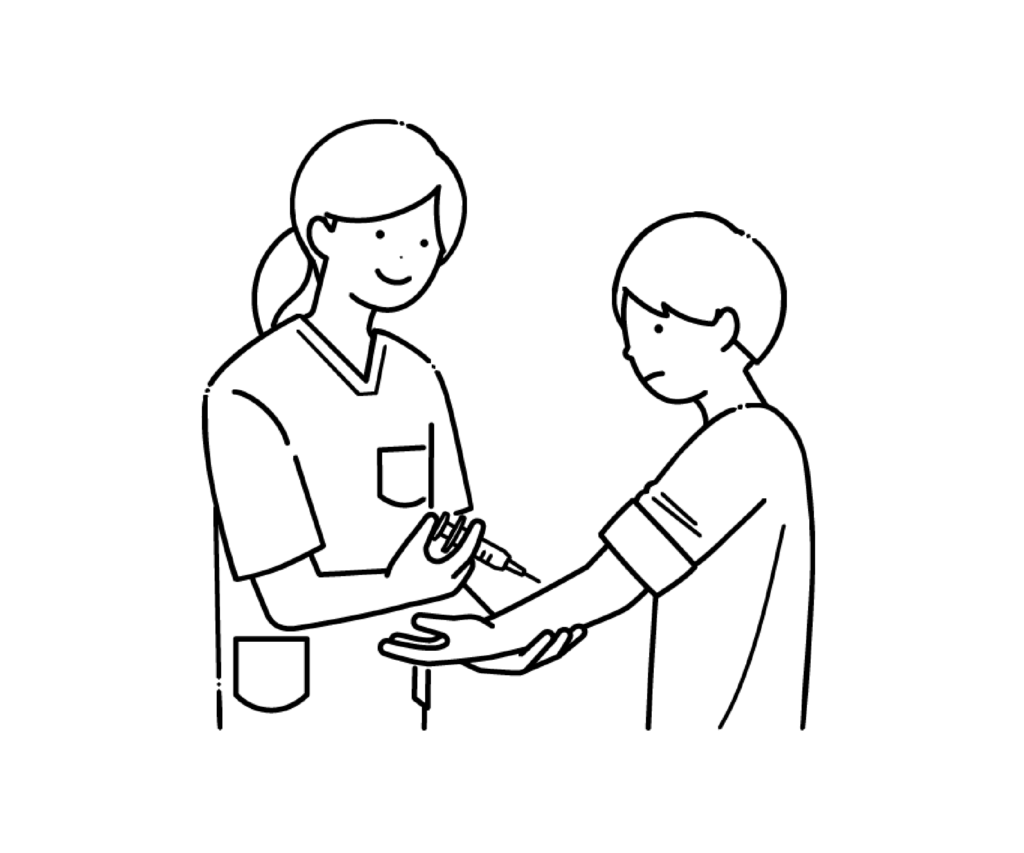 注射をするスクラブ姿の女性看護師の白黒イラスト