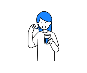 水で薬を飲む女性のイラスト